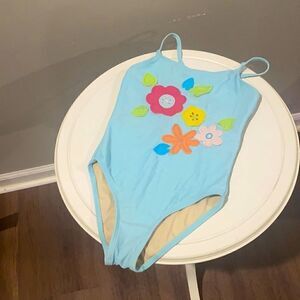 Girls one piece, flower swimsuit. Girls S. Only worn once for a pageant.